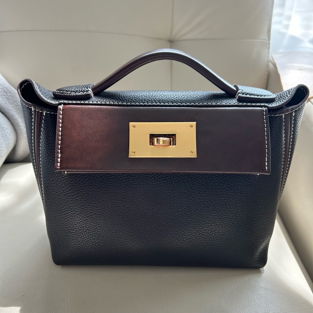 Classic Black and Brown Leather Satchels with Gold Accents